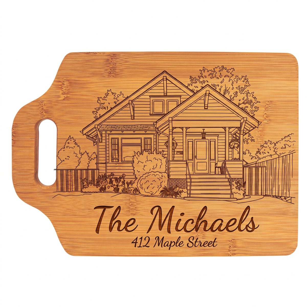 Bamboo cutting board with handle, engraved with the home and family name